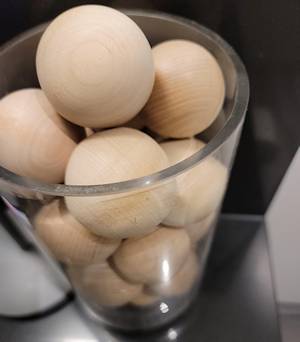 3inch wood ballls in a cup