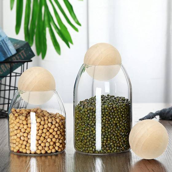 solid wooden balls used as jar lids.