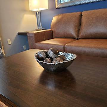 Decorative mango wooden balls on a bowl