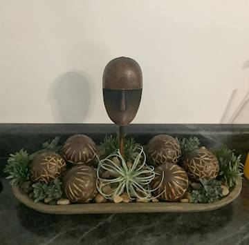 Decorative mango wooden balls on a tray