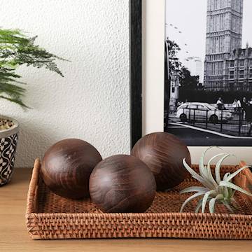 three decorative hardwood painted balls