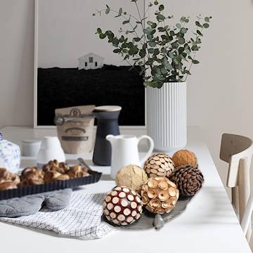 decorative wood balls for trays on a table