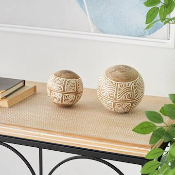 decorative carved orbs