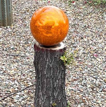 orange glass gazing ball